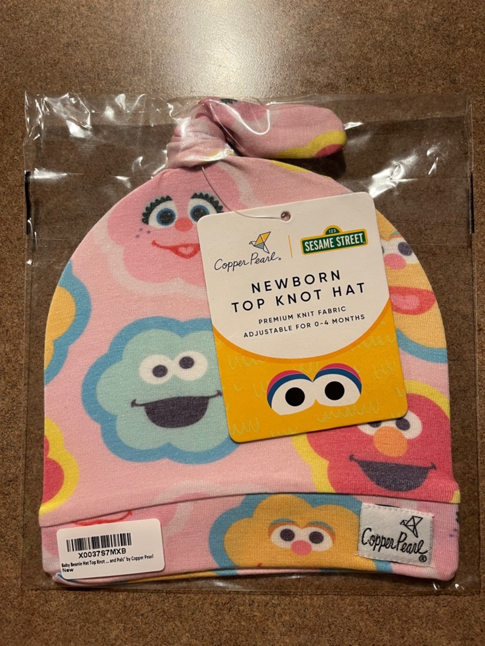 Copper Pearl Abby and Pals Sesame Street Pink Newborn Top Knot Hat